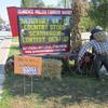 Our Clarence Hollow Farmers' Market Marquee, featuring Walter the Market Scarecrow